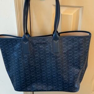 Navy Michael Kors tote only used one. Excellent condition,